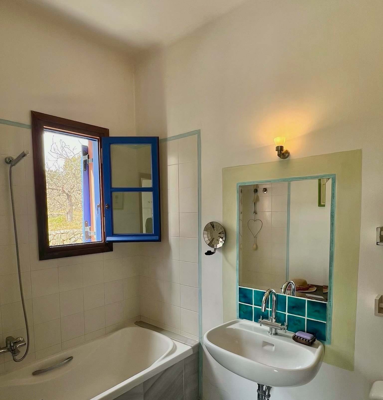 First bathroom First bathroom with bathtub