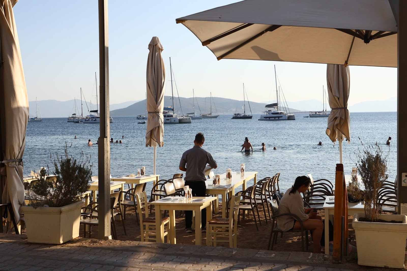 Eating by the sea Tavern on the beach in Aegina Town